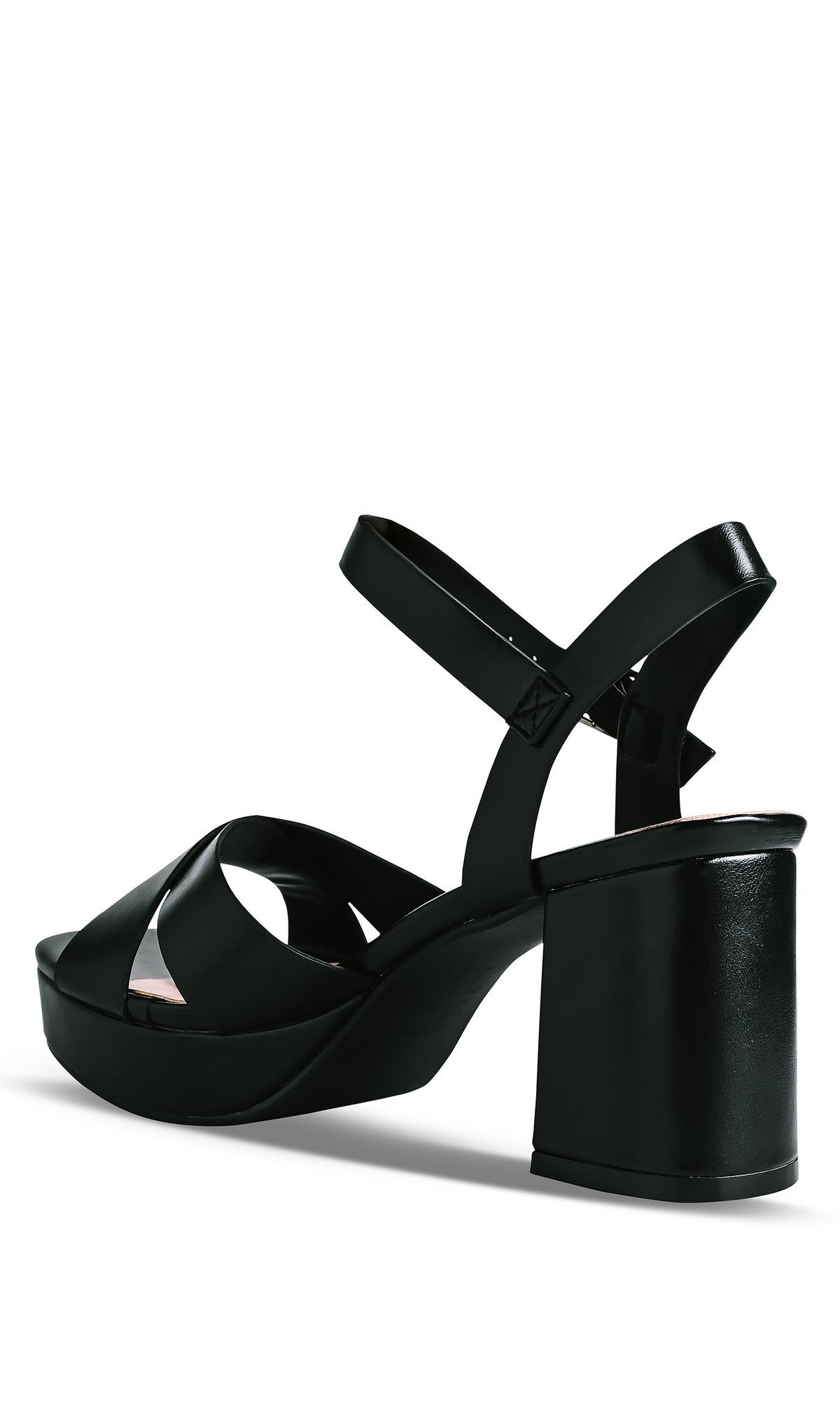 The Toby Black Prom Shoes: Touch Ups 4765 feature black faux leather, thick crisscross straps, an open toe, ankle strap, and chunky block heel—stylish high-heeled sandals perfect for prom, beautifully shown from the back angle.